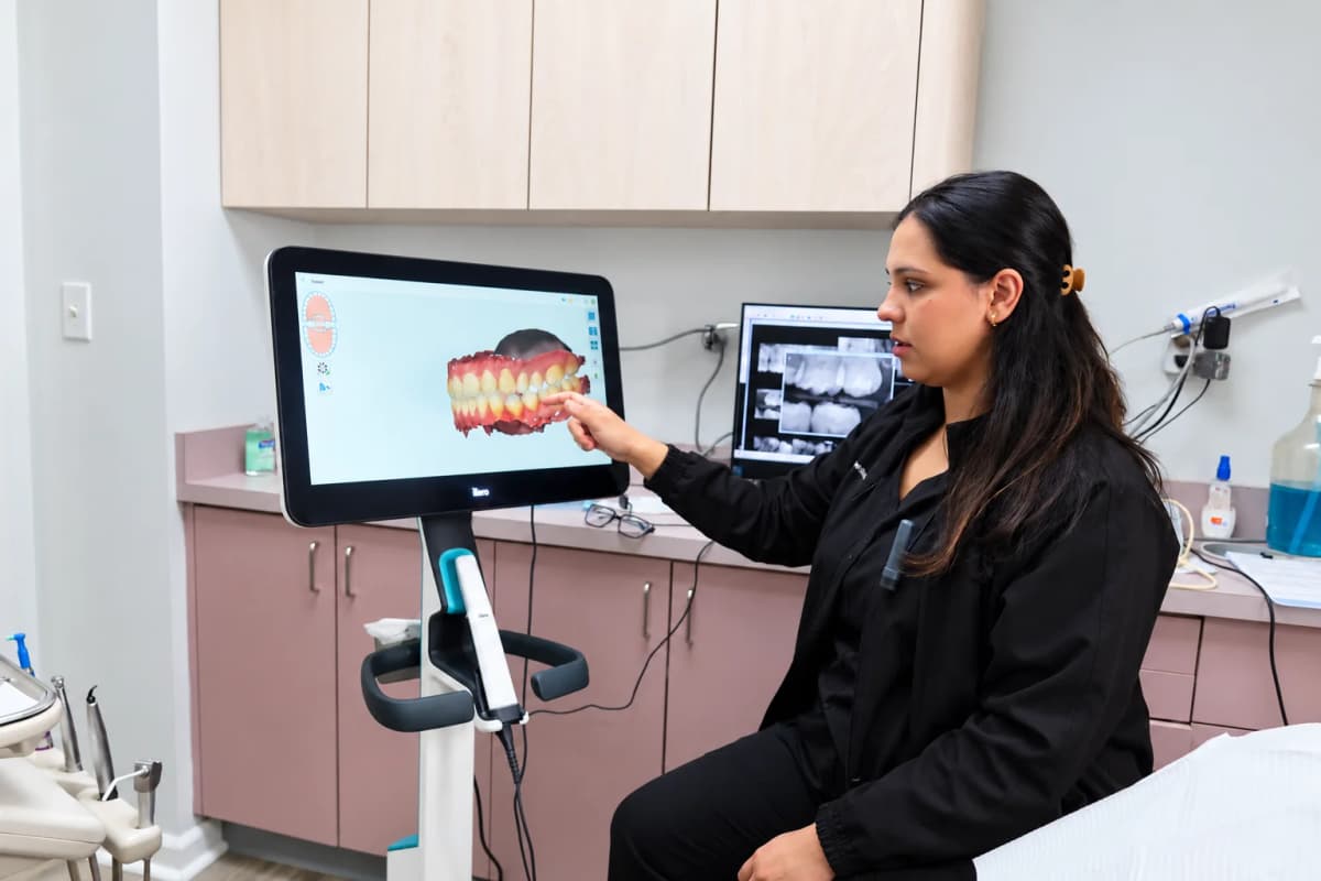 Dr. Iqra Ahmed discussing a digital tooth scan at Englewood Dentistry