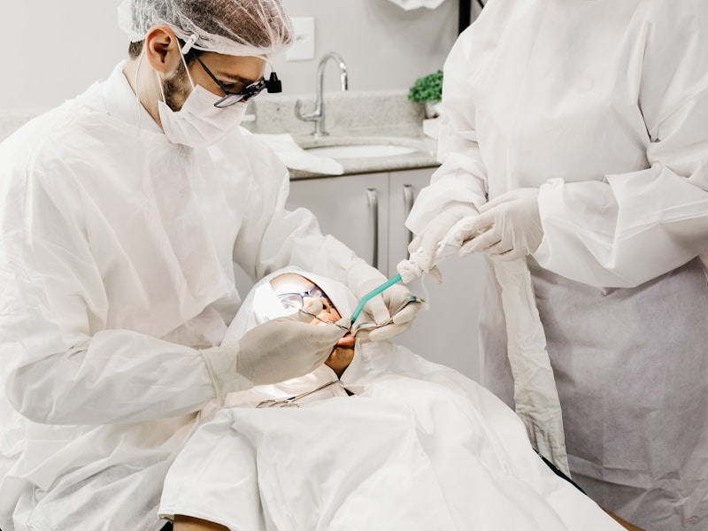 Oral surgeon with dental equipment preparing for a procedure at Englewood Dentistry
