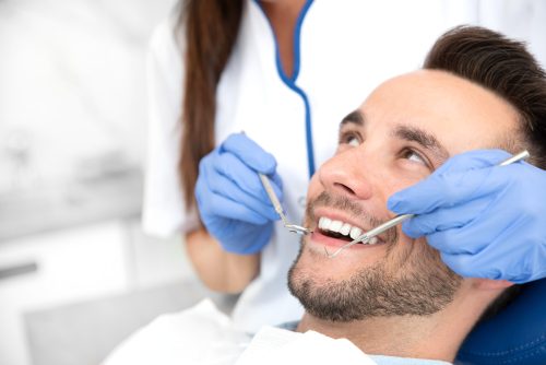 Man smiling during dental exam