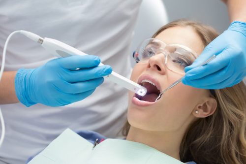 patient exam with intraoral camera